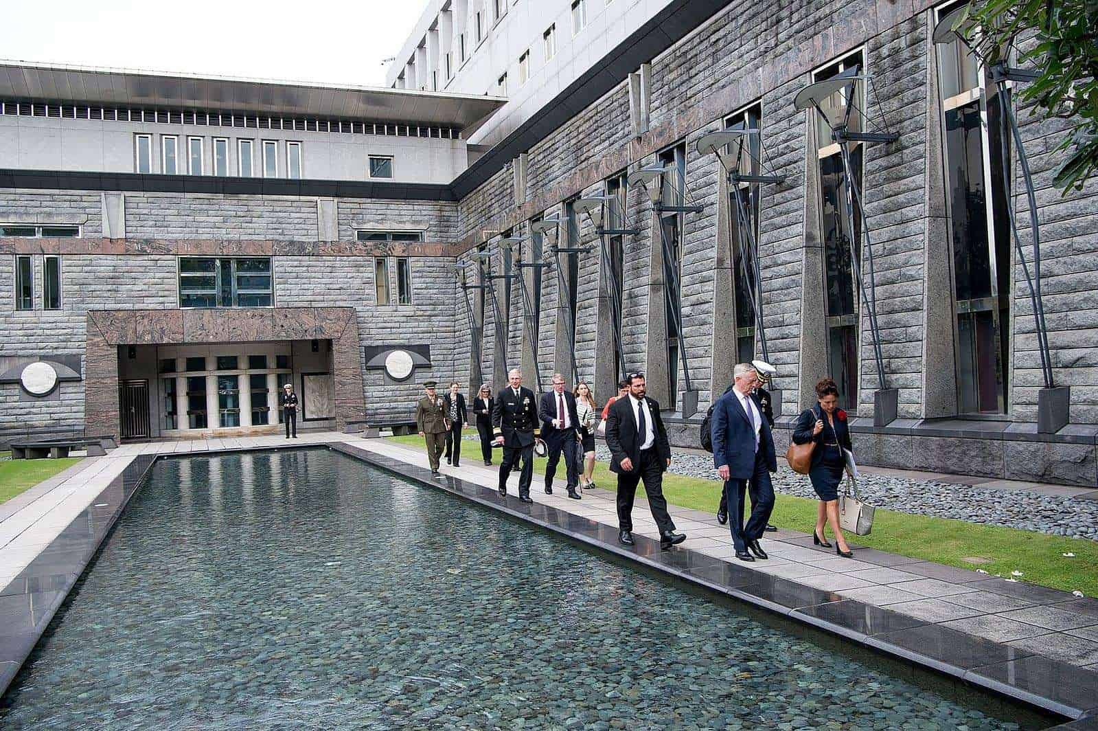 Secretary of Defense Jim Mattis walks with Chargé d’Affaires Stephanie Syptak-Ramnath during a visit to the U.S. Embassy in Singapore (2017) Jim Mattis | Wikimedia Commons