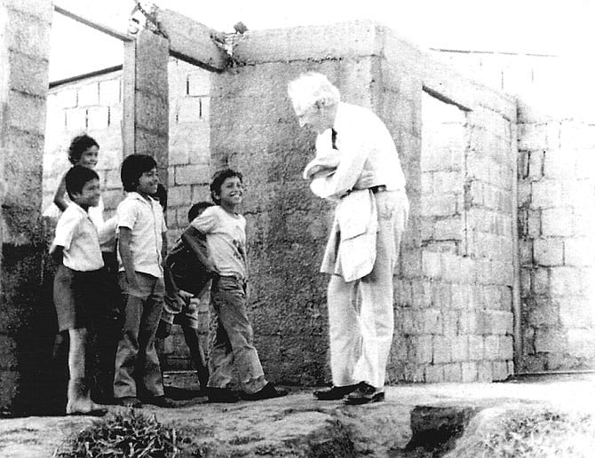 Peter Kimm with children at home under construction in Costa Rica | Peter Kimm’s Personal Collection