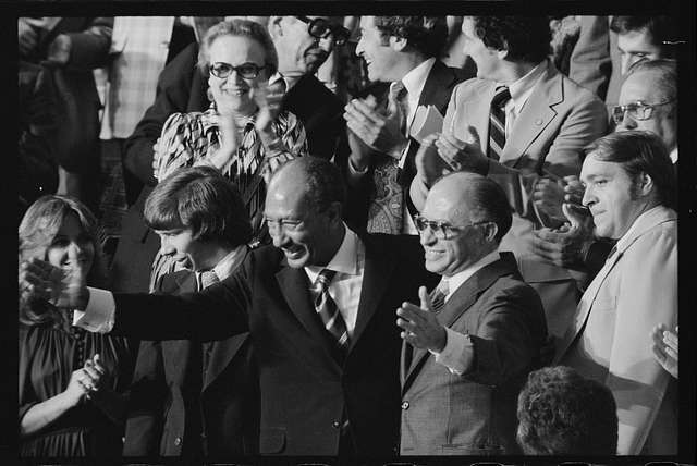 Egyptian President Anwar Sadat and Israeli Prime Minister Menachem Begin acknowledge applause during a Joint Session of Congress after President Jimmy Carter announced the results of the Camp David Accords | U.S. News & World Report Magazine Photograph Collection | 1978