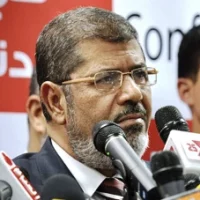 Mohamed Morsi at the press conference on June 18, 2012 as he announces himself president, after the second round of Egypt's presidential elections (18 June 2012) Jonathan Rashad | Fickr | Wikipedia Commons 