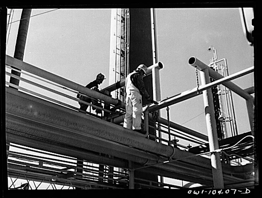Workers Making Repairs in a Pipeline System (1942), J. Vachon | Library of Congress