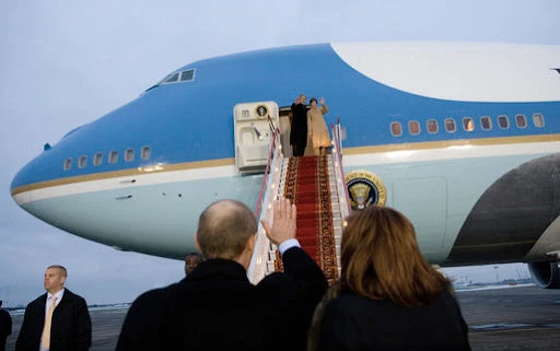 President George W. Bush and Mrs. Laura Bush wave goodbye to President Vladimir Putin and Mrs. Lyudmila Putina after a brief visit Wednesday, Nov. 15, 2006, in Moscow before heading to Singapore, Eric Draper | White House Photo