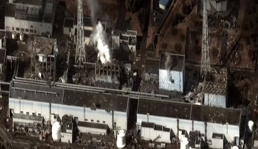 The Fukushima I Nuclear Power Plant after the 2011 Tōhoku earthquake and tsunami. Reactor 1 to 4 from right to left, March 16, 2011, Digital Globe, Earthquake and Tsunami damage-Dai Ichi Power Plant, Japan.