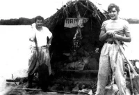 Ernesto Guevara with Alberto Granado aboard their "Mambo-Tango" raft on the Amazon River in June of 1952. Museo Che Guevara