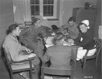 American war crimes investigators question chief nurse Irmgard Huber at the Hadamar Institute, 4 May 1945. Troy A. Peters, US Army