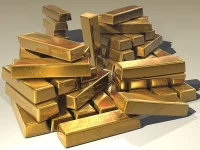 A pile of stacked gold bars. Stevebidmead