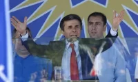 President Saakashvili faces strong opposition from Bidzina Ivanishvili, seen here addressing supporters at a rally in Tbilisi on Saturday. Shakh Aivazov/AP