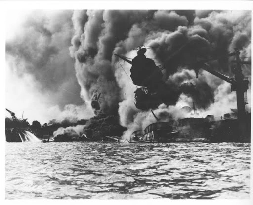 The USS Arizona burns on Dec 7, 1941.
- Department of the Navy