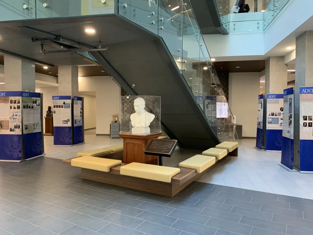 The panels of ADST's mobile exhibit flank the pillars of Root Hall at Carlisle Barracks, home of the U.S. Army War College in Carlisle, Pennsylvania, October 16, 2024. Photo by Tom Selinger.