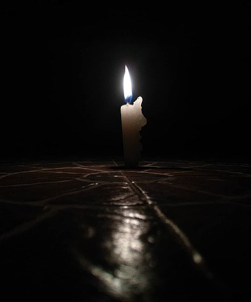 Candle in the dark. அமுதவளன் ஞானாதிக்கம்