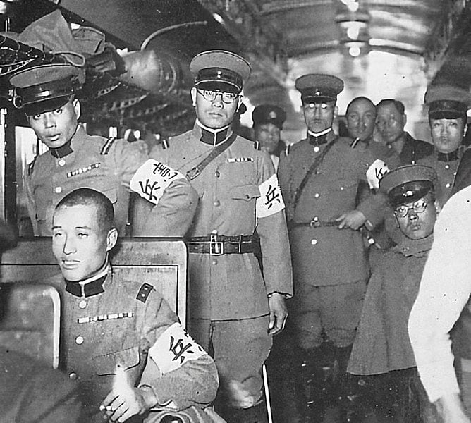 Kempeitai officers. Mainichi Newspapers Company