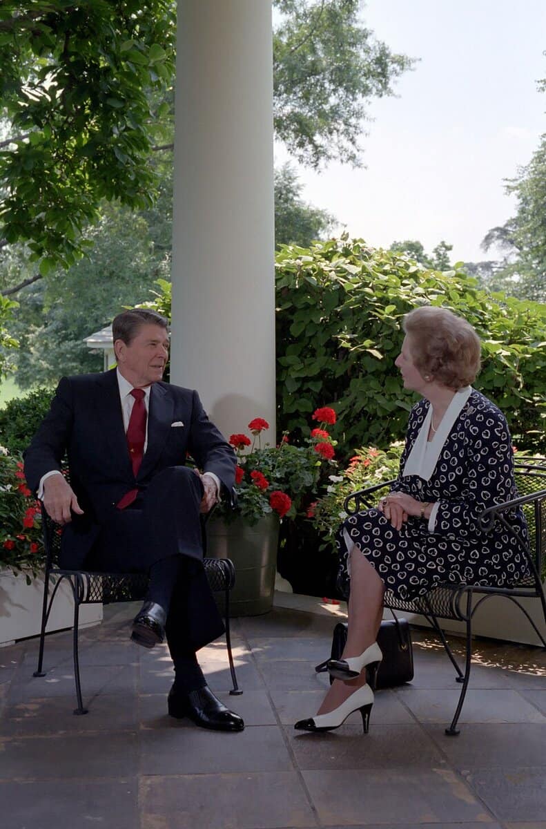 President Reagan and Prime Minister Thatcher talk on the patio outside the Oval Office. NARA