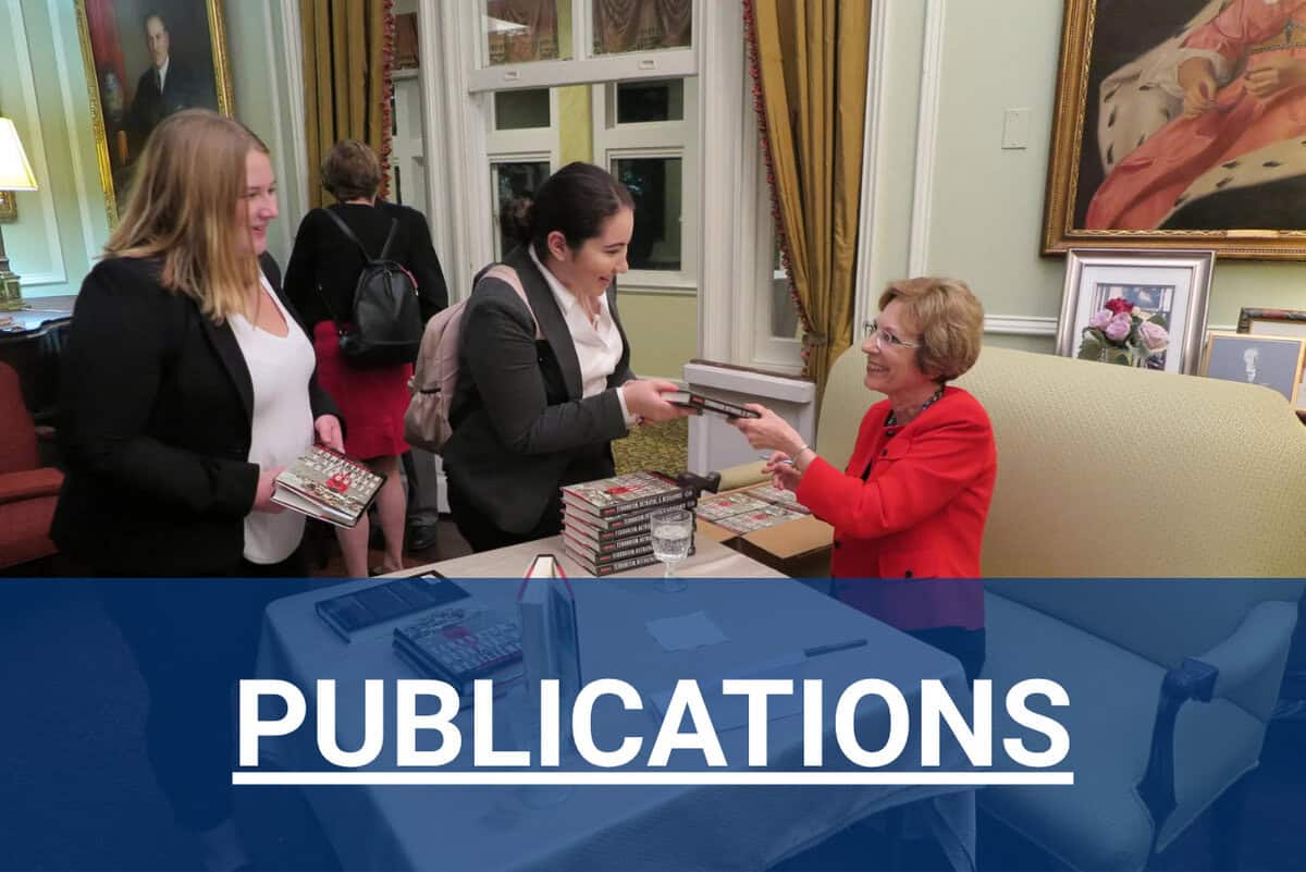 Amb. Pru Bushnell signing copies of her new book at DACOR Bacon House.
