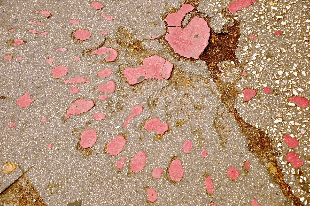 Sarajevo Rose has become a well-known memorial to those who perished during the siege of Sarajevo. Around 200 "roses" in the city depict places where mortar shells exploded | Wikimedia Commons. CC BY 2.0.