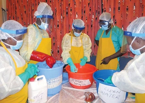 Participants learn to decontaminate medical equipment at Central Regional Training in Cape Coast, Ghana.