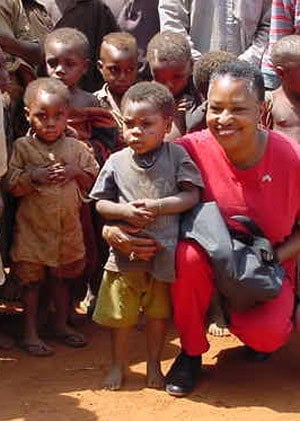 Mattie Sharpless greets children 
in the village of Mbaiki in 2012
during her time as U.S. Ambassador 
to the Central African Republic.
(State Department photo)